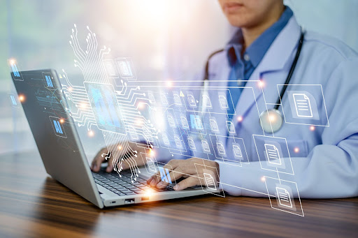 medical professional on computer