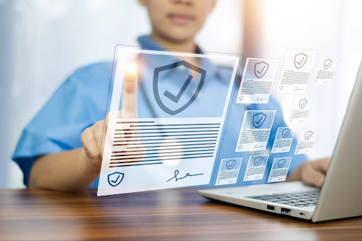 Medical profession looking at digital files on a computer